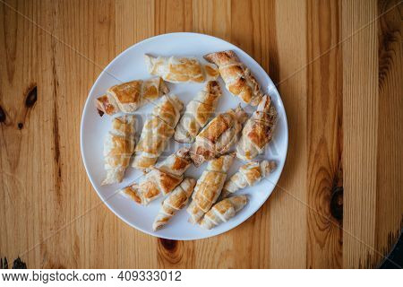 Freshly Homemede Baked Croissants On Wooden Board, Top View
