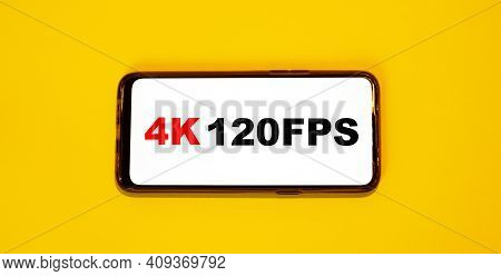 4k 120fps Screen Resolution Of A Concept Smartphone On An Orange Background