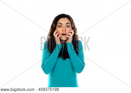Adorable teenage girl with blue sweater isolated on a white background