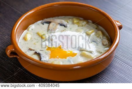 dill soup with poached egg