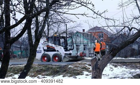 Maikop, Republic Of Adygea, Russia - January 16, 2021: Road Service Represented By A White Mini Load