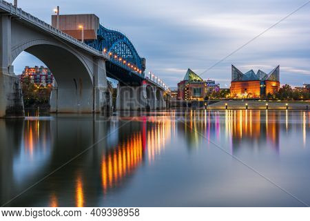 Chattanooga, Tennessee, USA downtown skyline on the Tennessee River at dusk.