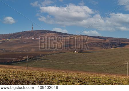 Wavy Landscape And Chapel Of St. Barbora Near Strazovice In The Czech Republic In Europe. In The Bac
