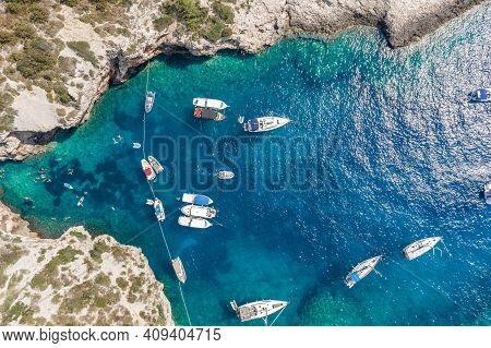 Aerial Overhead Drone Shot Of Yachts At Stiniva Cove Adriatic Sea On Vis Island In Croatia Summer