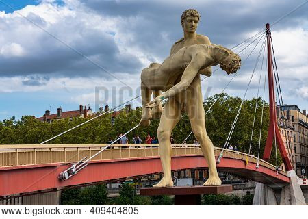 Lyon, France - Sep 28, 2020: Marble Statue Of 2 Men Called The Weight Of Oneself By Scandinavian Duo