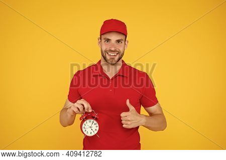 Timeliness Guarantee. Promptness And Punctuality. Delivery Time. Delivery Courier With Clock. Delive