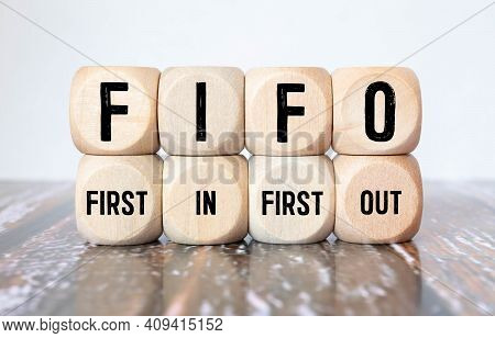 Alphabet Letter Block In Word Fifo Abbreviation Of First In First Out On Wood Background