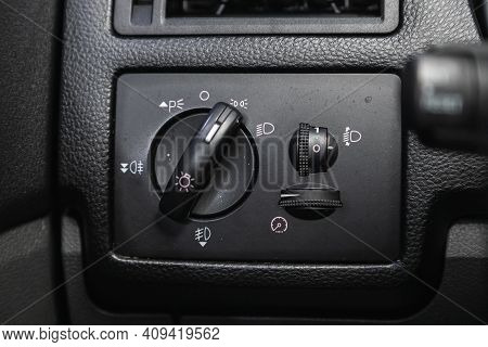 Novosibirsk, Russia - February 18 2021: Ford Kuga, Close-up Of The  Headlight Setting Buttons