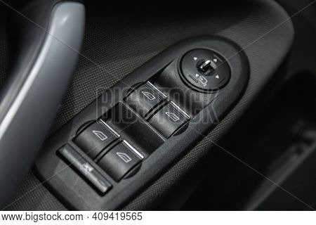 Novosibirsk, Russia - February 18 2021: Ford Kuga, Car Door Interior Armrest With Window Control Pan