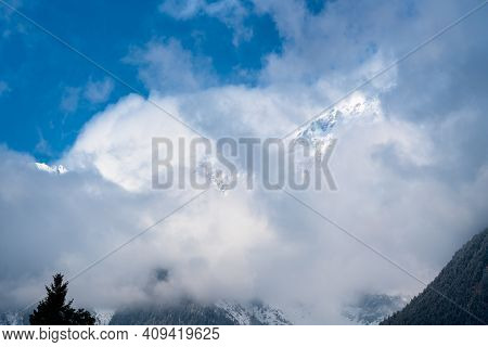 Rocky Winter Mountain With Sunny Snow Peaks Covered With Dramatic Clouds, Mieminger Plateau, Tirol, 