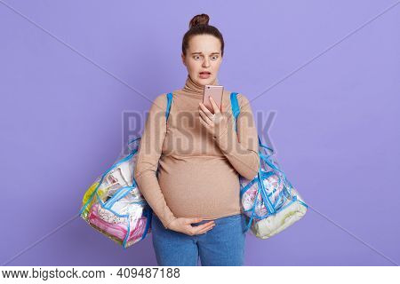 Pregnant Panicked Screaming Woman Holding Mobile Phone, Using App For Contractions, Need To Go To Ma