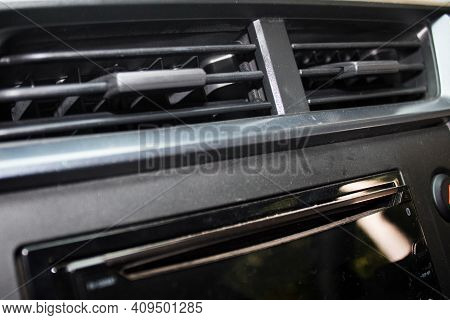 The Hole Contains The Bulkhead Controlling The Direction Of The Ac Air Flow On The Black Car Dashboa