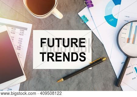 Future Trends Is Written In A Document On The Office Desk With Office Accessories, Coffee, Diagram A