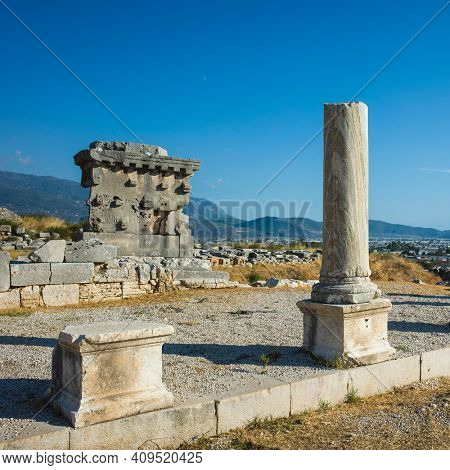 Ruins at Xanthos Ancient Lycia City, Turkey. Old Lycian civilization heritage architecture, broken column