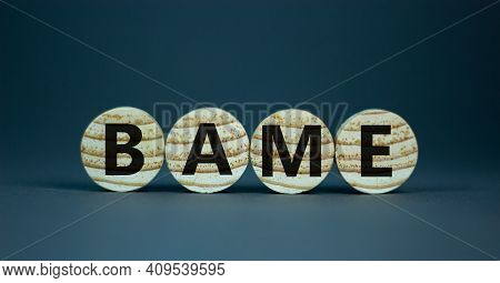 Bame Symbol. Abbreviation Bame, Black, Asian And Minority Ethnic On Wooden Circles. Beautiful Grey B