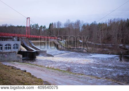 Hydroelectric Power Station Water Level At The Early Winter. Green Energy Of Moving Water. Linnamae 