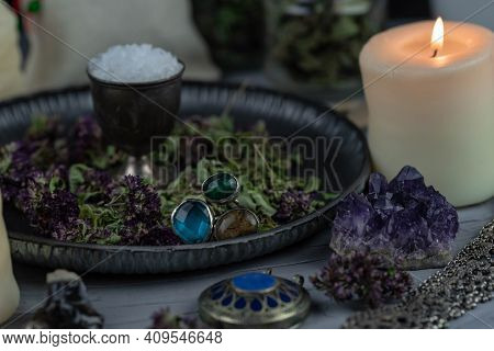 Magic Altar With Mystical Herbs, Salt, Candles And Crystals. Witch Sanctuary Sacred Esoteric Concept