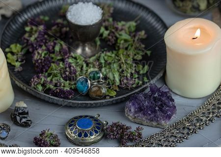 Magic Altar With Mystical Herbs, Salt, Candles And Crystals. Witch Sanctuary Sacred Esoteric Concept
