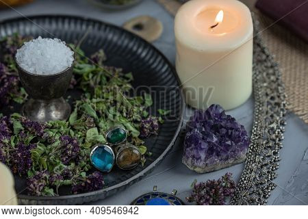 Magic Altar With Mystical Herbs, Salt, Candles And Crystals. Witch Sanctuary Sacred Esoteric Concept