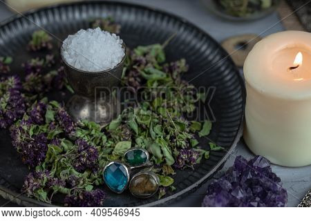 Magic Altar With Mystical Herbs, Salt, Candles And Crystals. Witch Sanctuary Sacred Esoteric Concept