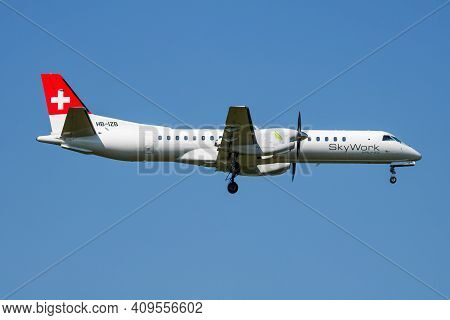 Vienna, Austria - May 13, 2018: Skywork Airlines Saab 2000 Hb-izb Passenger Plane Arrival And Landin