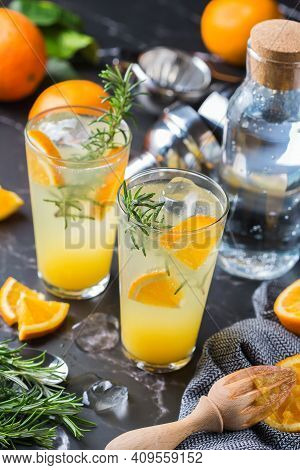 Hard Seltzer Cocktail With Orange, Rosemary And Bartenders Accessories