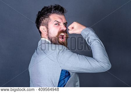 Angry Guy Bought Counterfeit Or Fake Brand. Man With Beard Wears Jacket With Hole. Hipster Chose Sma