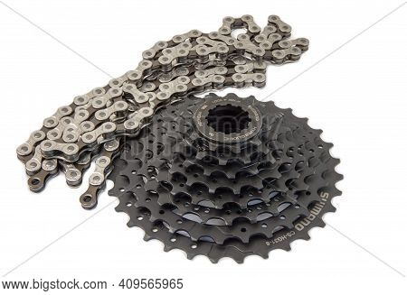Krasnodar, Russia - February 12, 2021: New 8-speed Shimano Bicycle Cassette Kit And M-wave Chain Ins