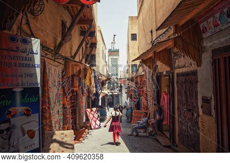 Fez, Morocco - May 31, 2017: Unknown Girl In Medina Quarter Of Fez. The Medina Of Fez Is Listed As A