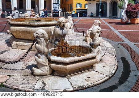 Bergamo, Italy - May 22, 2019: Historical Fountain (fontana Del Contarini) On The Piazza Vecchia St.