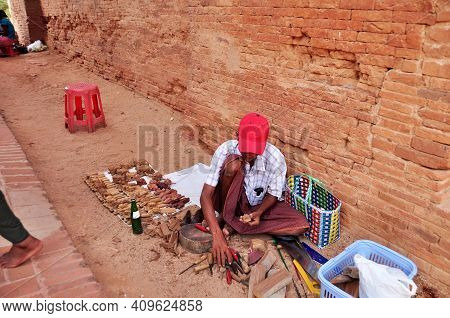 Burmese Men Craftsmanship People Sit On Floor Carving Wooden Toy Souvenir Gift For Sale Travelers In