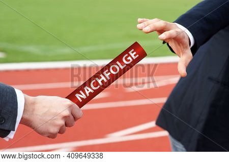 Businessman Passes Baton With German Word Nachfolge Means Succession