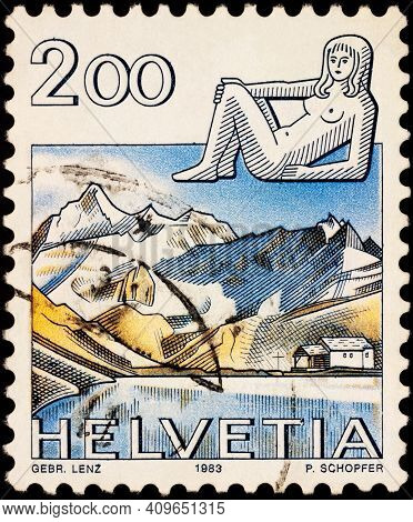 Moscow, Russia - February 21, 2021: Stamp Printed In Switzerland Shows Image Of Virgo - Sign Of Zodi