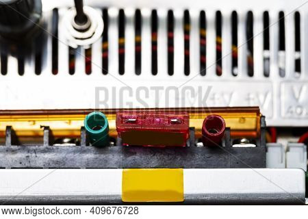 Closeup Of Laboratory Power Supply Terminals With Contacts And Switches On Back Side.