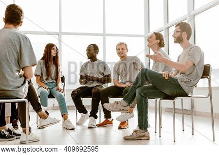Group Of Young Like-minded People Discussing Their Ideas