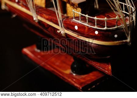 A Model Of A Small Ship In Total Darkness. Handmade Model.