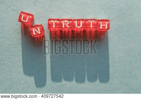 Untruth Is A Word Made Up Of Letters On Cubes, The First Letters Fall Apart