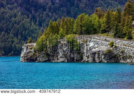 View of small alpine lake (Lago di Ceresole) in Piedmont, Northern Italy.
