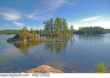 Calm And Beautiful Morning On Saganagons Lake In Quetico Provincial Park In Ontario
