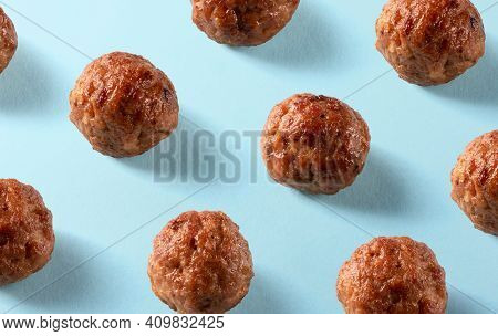 American Beef Meatballs Pattern On Blue Background. Cuisine, Menu, Recipe Backdrop. Isometric. Delic