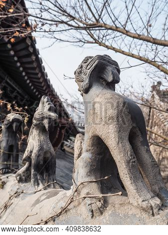 Row Of Stone Roof Figurines At The Huayan Temple At Mountain Laoshan, Qingdao, China