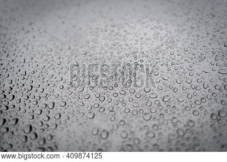 Closeup Of A Window In Rain With Water Drops All Over - Shallow Depth Of Field