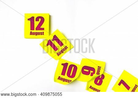 August 12nd. Day 12 Of Month, Calendar Date. Many Yellow Sheet Of The Calendar. Summer Month, Day Of