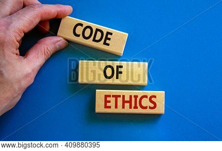 Code Of Ethics Symbol. Concept Words 'code Of Ethics' On Wooden Blocks On A Beautiful Blue Backgroun