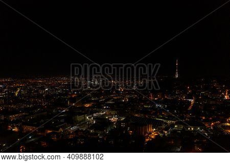 Night City Of Lviv, Aerial View, Illuminated Streets And Squares Of The City.