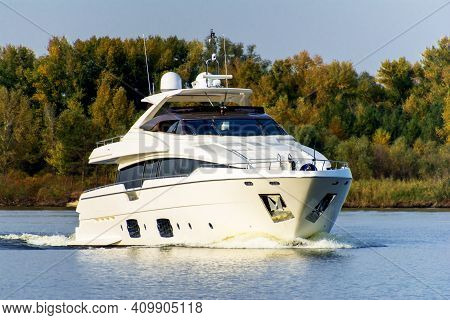 Close-up Of White Luxury Yacht In Motion On The Dniepr River, Side View