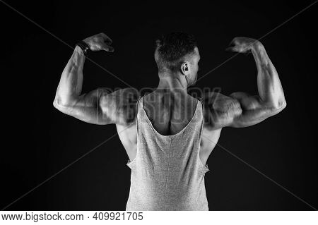 Lets Get That Body Trained. Fit Guy Flex Arms Showing Biceps Triceps. Muscle Power. Power And Streng