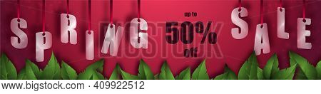 Spring Sale Background With Beautiful Leaves. Translucent Glass Or Plastic Letters On Red Silk Ribbo