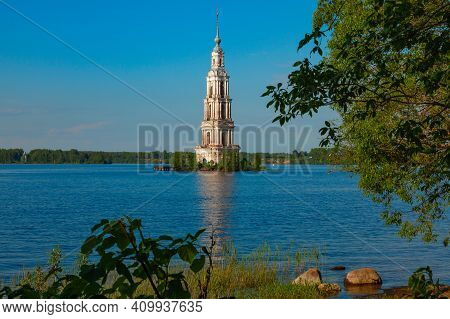 A Picturesque View Of The Kolyazinskaya Flooded Bell Tower. Can Serve As A Symbol Of The Inviolabili