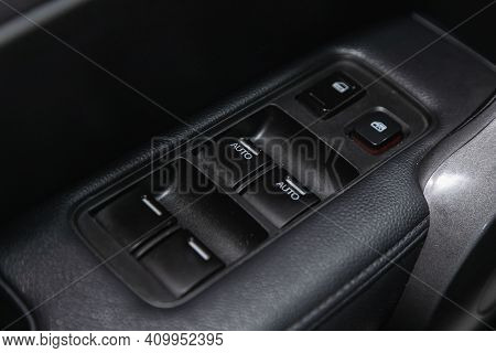 Novosibirsk, Russia - February 22 2021:  Honda Cr-v, Interior Of Modern Car. Side Door Buttons: Wind